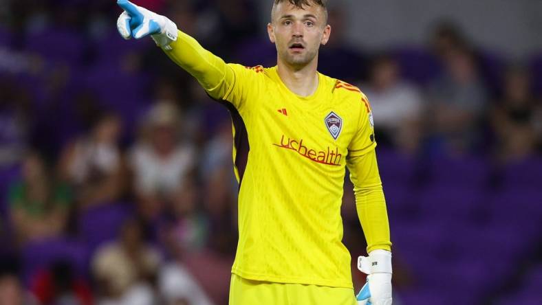 Jun 10, 2023; Orlando, Florida, USA;  Colorado Rapids goalkeeper Marko Ilic (1) directs his team during a free kick against Orlando City SC in the second half at Exploria Stadium. Mandatory Credit: Nathan Ray Seebeck-USA TODAY Sports