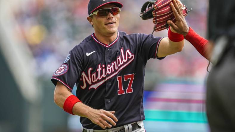 Jun 11, 2023; Cumberland, Georgia, USA; Washington Nationals center fielder Alex Call (17) reacts after making a leaping catch to take a hit away from Atlanta Braves center fielder Michael Harris II (23) (not shown) during the sixth inning at Truist Park. Mandatory Credit: Dale Zanine-USA TODAY Sports