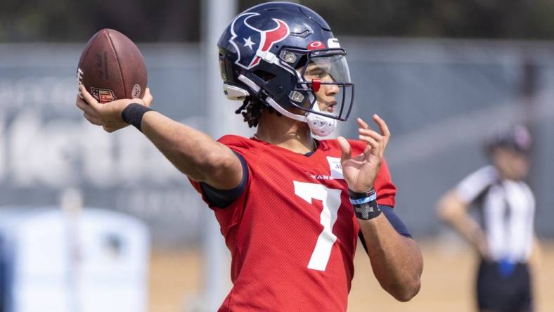 Jun 14, 2023; Houston, Texas, USA;  Houston Texans quarterback C.J. Stroud (7) drops back to throw during the Texans minicamp at the Houston Texans Methodist Training Center. Mandatory Credit: Thomas Shea-USA TODAY Sports