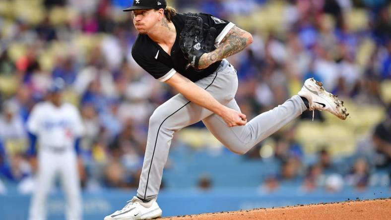 Jun 14, 2023; Los Angeles, California, USA; Chicago White Sox starting pitcher Mike Clevinger (52) throws against the Los Angeles Dodgers during the first inning at Dodger Stadium. Mandatory Credit: Gary A. Vasquez-USA TODAY Sports