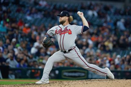 Jun 12, 2023; Detroit, Michigan, USA;  Atlanta Braves relief pitcher A.J. Minter (33) pitches against the Detroit Tigers at Comerica Park. Mandatory Credit: Rick Osentoski-USA TODAY Sports