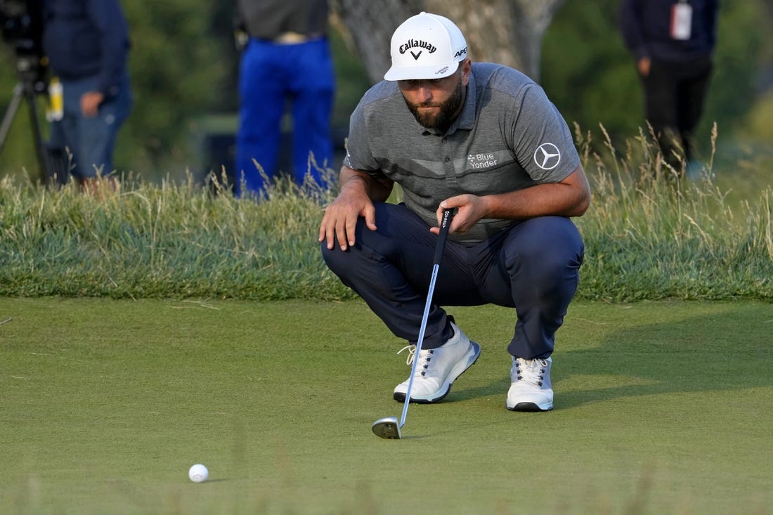 Jun 16, 2023; Los Angeles, California, USA; Jon Rahm lines up a putt on the 15th green during the second round of the U.S. Open golf tournament at Los Angeles Country Club. Mandatory Credit: Michael Madrid-USA TODAY Sports