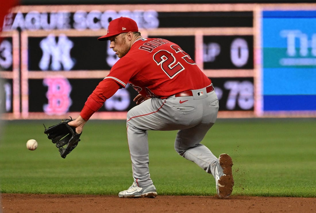 Jun 16, 2023; Kansas City, Missouri, USA;  Los Angeles Angels second baseman Brandon Drury (23) fields a ground ball in the ninth inning against the Kansas City Royals at Kauffman Stadium. Mandatory Credit: Peter Aiken-USA TODAY Sports