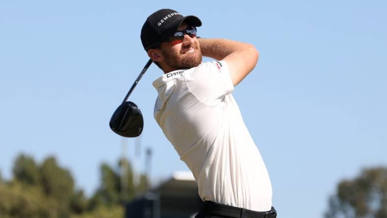 Jun 17, 2023; Los Angeles, California, USA; Patrick Rodgers tees off on the eighteenth tee during the third round of the U.S. Open golf tournament at Los Angeles Country Club. Mandatory Credit: Kiyoshi Mio-USA TODAY Sports