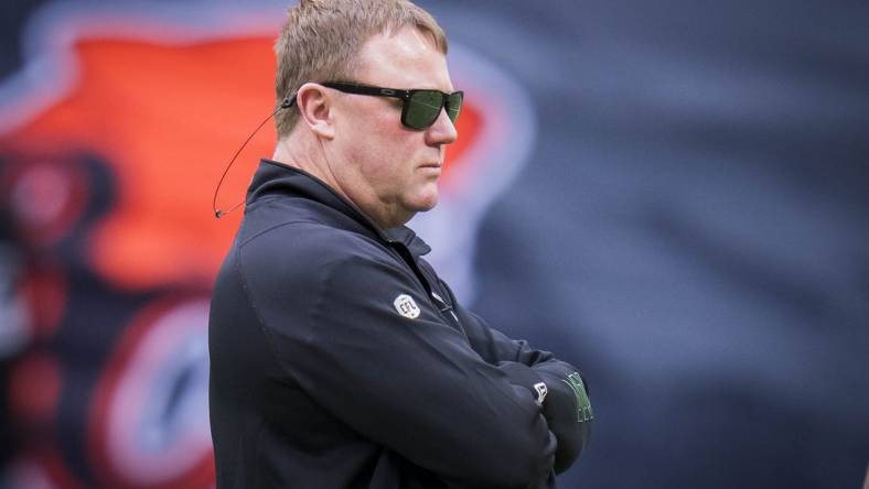 Jun 17, 2023; Vancouver, British Columbia, CAN; Edmonton Elks head coach and general manager Chris Jones watches his players during warm up prior to a game against the BC Lions at BC Place. Mandatory Credit: Bob Frid-USA TODAY Sports