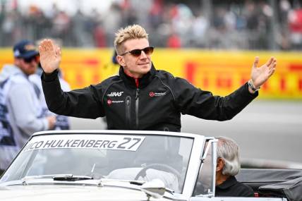 Jun 18, 2023; Montreal, Quebec, CAN; Haas F1 Team driver Nico Hulkenberg (GER) parades and salutes the crowd before the Canadian Grand Prix at Circuit Gilles Villeneuve. Mandatory Credit: David Kirouac-USA TODAY Sports