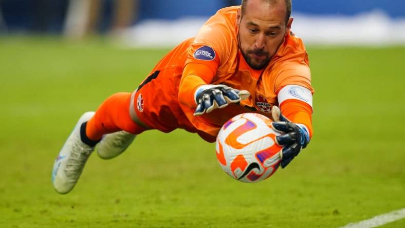 Jun 18, 2023; Las Vegas, Nevada, USA; Canada goalkeeper Milan Borjan (18) makes a save during the first half against the USA at Allegiant Stadium. Mandatory Credit: Lucas Peltier-USA TODAY Sports