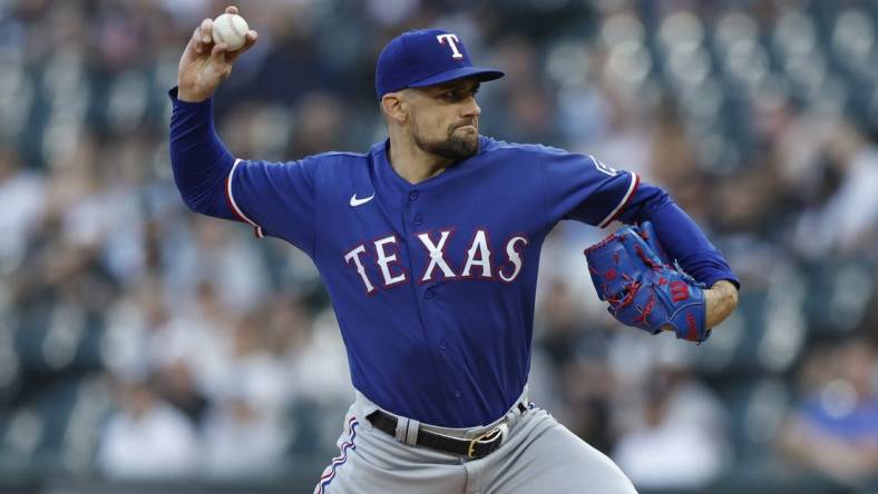 Jun 20, 2023; Chicago, Illinois, USA; Texas Rangers starting pitcher Nathan Eovaldi (17) pitches against the Chicago White Sox during the first inning at Guaranteed Rate Field. Mandatory Credit: Kamil Krzaczynski-USA TODAY Sports