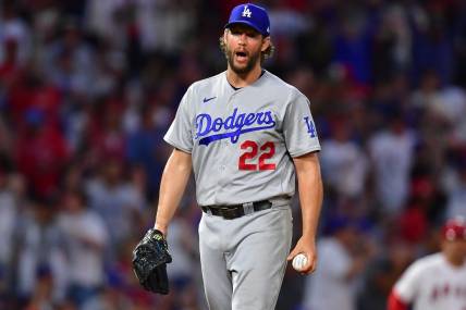 Jun 20, 2023; Anaheim, California, USA; Los Angeles Dodgers starting pitcher Clayton Kershaw (22) reacts after the home plate video review on Los Angeles Angels right fielder Hunter Renfroe (12) is overturned in the fourth inning at Angel Stadium. Mandatory Credit: Gary A. Vasquez-USA TODAY Sports