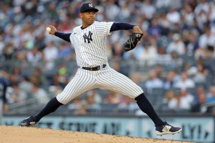 Jun 21, 2023; Bronx, New York, USA; New York Yankees starting pitcher Jhony Brito (76) pitches against Seattle Mariners during the second inning at Yankee Stadium. Mandatory Credit: Brad Penner-USA TODAY Sports