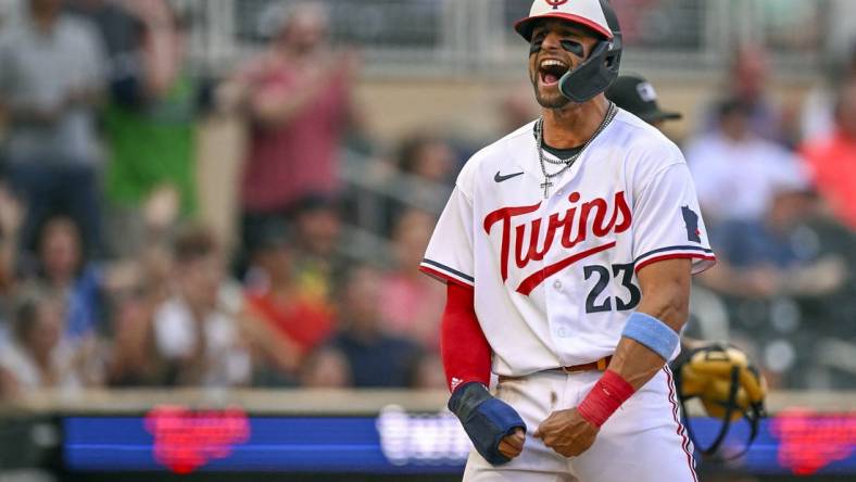 Jun 21, 2023; Minneapolis, Minnesota, USA;  Minnesota Twins infielder Royce Lewis (23) reacts after scoring a run against the Boston Red Sox during the second inning at Target Field. Mandatory Credit: Nick Wosika-USA TODAY Sports