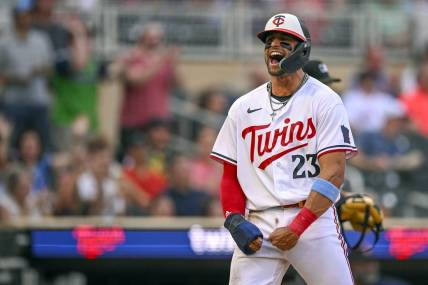 Jun 21, 2023; Minneapolis, Minnesota, USA;  Minnesota Twins infielder Royce Lewis (23) reacts after scoring a run against the Boston Red Sox during the second inning at Target Field. Mandatory Credit: Nick Wosika-USA TODAY Sports