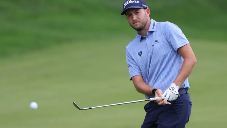 Jun 23, 2023; Cromwell, Connecticut, USA; Lee Hodges plays his shot on the 15th hole during the second round of the Travelers Championship golf tournament. Mandatory Credit: Vincent Carchietta-USA TODAY Sports