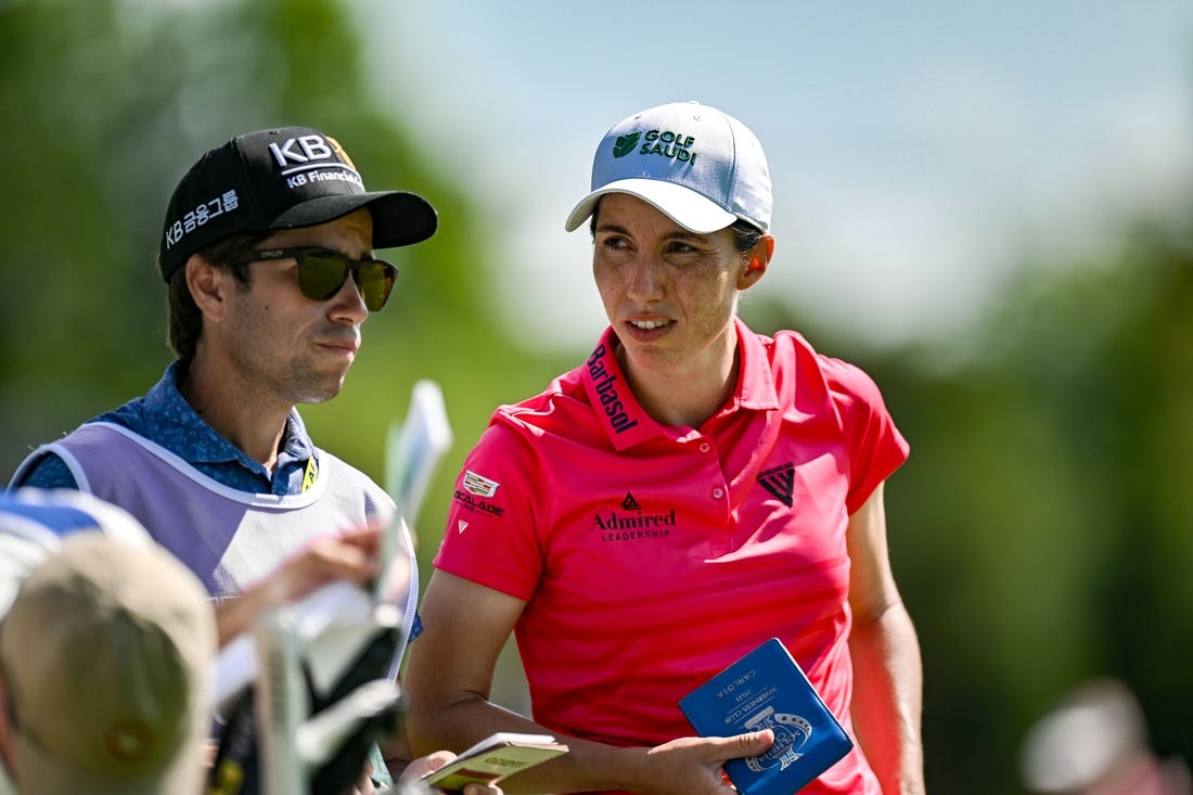 Jun 25, 2023; Springfield, New Jersey, USA; Carlota Ciganda talks to her caddy on the 4th hole during the final round of the KPMG Women's PGA Championship golf tournament. Mandatory Credit: John Jones-USA TODAY Sports