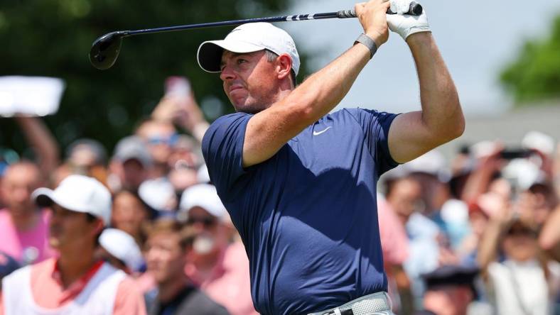 Jun 25, 2023; Cromwell, Connecticut, USA; Rory McIlroy plays his shot from the first tee during the final round of the Travelers Championship golf tournament. Mandatory Credit: Vincent Carchietta-USA TODAY Sports