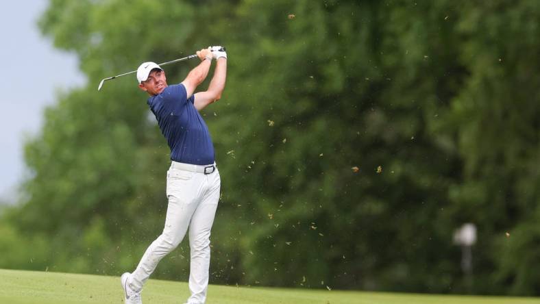 Jun 25, 2023; Cromwell, Connecticut, USA; Rory McIlroy plays his shot on the 14th hole during the final round of the Travelers Championship golf tournament. Mandatory Credit: Vincent Carchietta-USA TODAY Sports