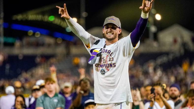 Jun 26, 2023; Omaha, NE, USA; LSU Tigers center fielder Dylan Crews (3) celebrates after winning the College World Series over the Florida Gators at Charles Schwab Field Omaha. Mandatory Credit: Dylan Widger-USA TODAY Sports