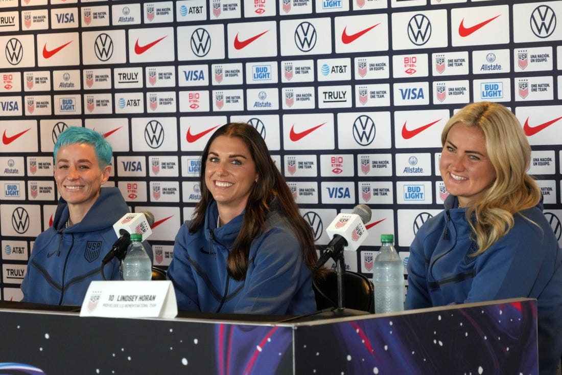 Jun 27, 2023; Carson, California, USA; USWNT forward Megan Rapinoe (left), forward Alex Morgan (center) and midfielder Lindsey Horan during Women's World Cup media day at Dignity Health Sports Park. Mandatory Credit: Kirby Lee-USA TODAY Sports