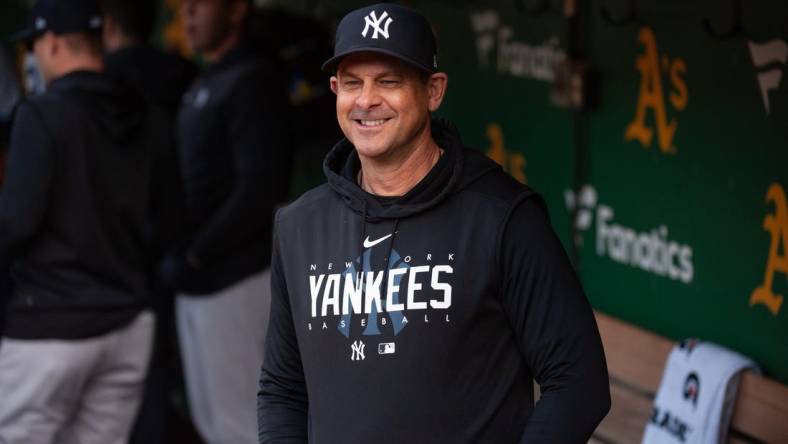 Jun 27, 2023; Oakland, California, USA; New York Yankees manager Aaron Boone (17) smiles before the game against the Oakland Athletics at Oakland-Alameda County Coliseum. Mandatory Credit: Ed Szczepanski-USA TODAY Sports