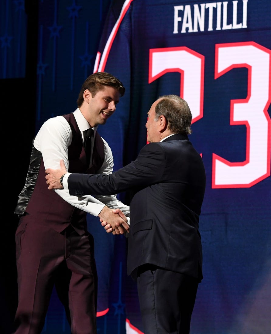 Jun 28, 2023; Nashville, Tennessee, USA; NHL commissioner Gary Bettman congratulates Columbus Blue jackets third overall pick Adam Fantilli during round one of the 2023 NHL Draft at Bridgestone Arena. Mandatory Credit: Christopher Hanewinckel-USA TODAY Sports