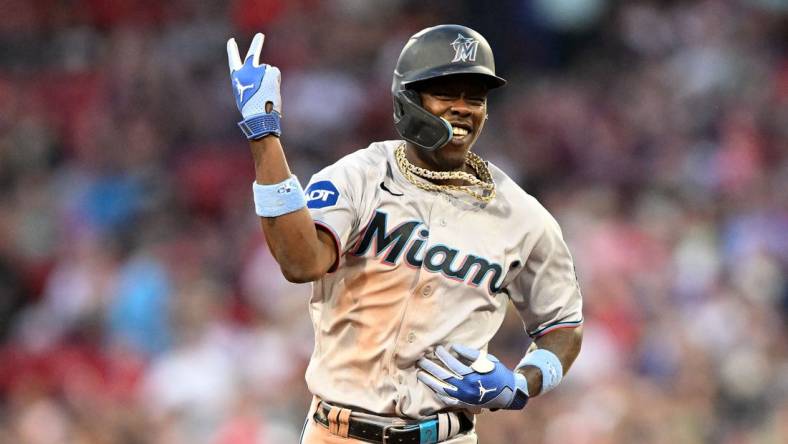 Jun 29, 2023; Boston, Massachusetts, USA; Miami Marlins center fielder Jazz Chisholm Jr. (2) reacts after hitting a home run against the Boston Red Sox during the ninth inning at Fenway Park. Mandatory Credit: Brian Fluharty-USA TODAY Sports