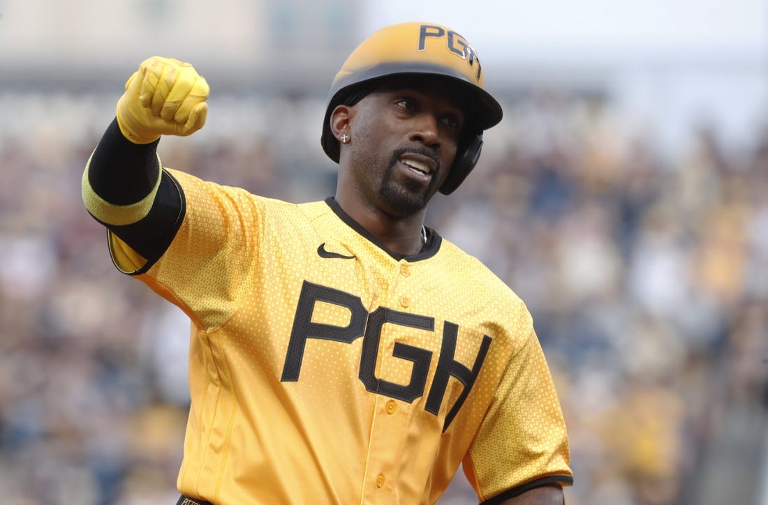 Jun 30, 2023; Pittsburgh, Pennsylvania, USA;  Pittsburgh Pirates designated hitter Andrew McCutchen (22) reacts as he circles the bases on a solo home run against the Milwaukee Brewers during the fourth inning at PNC Park. Mandatory Credit: Charles LeClaire-USA TODAY Sports