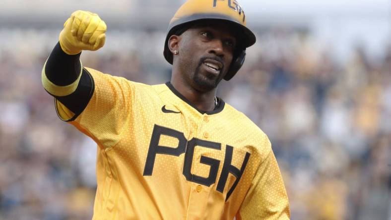 Jun 30, 2023; Pittsburgh, Pennsylvania, USA;  Pittsburgh Pirates designated hitter Andrew McCutchen (22) reacts as he circles the bases on a solo home run against the Milwaukee Brewers during the fourth inning at PNC Park. Mandatory Credit: Charles LeClaire-USA TODAY Sports