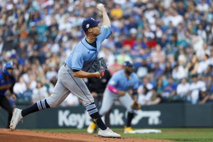 Jun 30, 2023; Seattle, Washington, USA; Tampa Bay Rays starting pitcher Shane McClanahan (18) throws against the Seattle Mariners during the first inning at T-Mobile Park. Mandatory Credit: Joe Nicholson-USA TODAY Sports