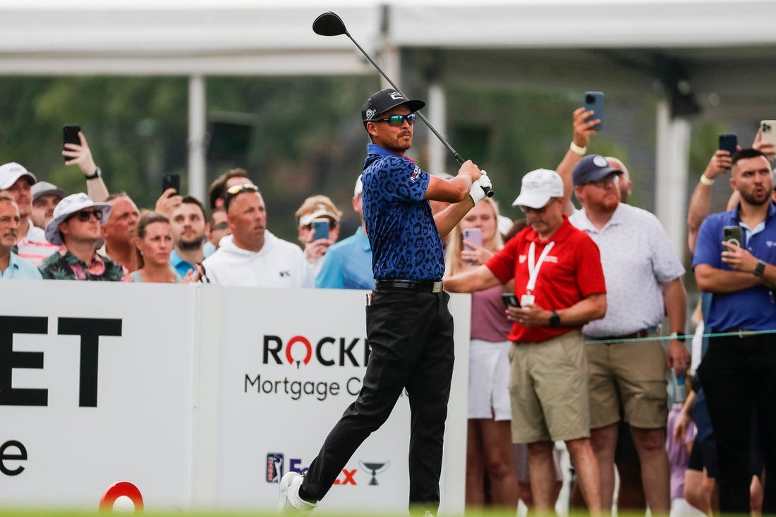 Rickie Fowler tees for the third hole during the third round of the Rocket Mortgage Classic at Detroit Golf Club in Detroit on Saturday, July 1, 2023.