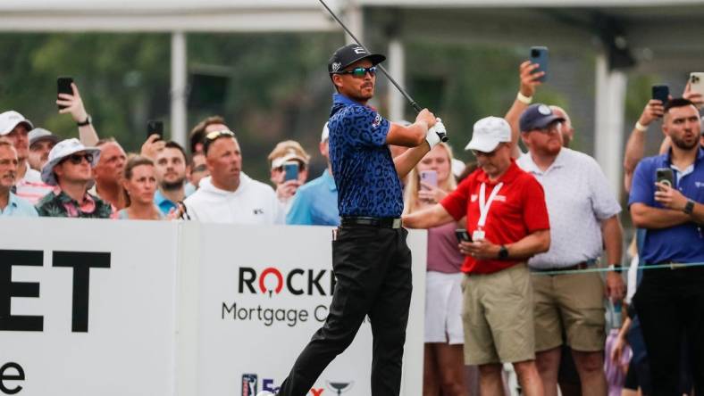 Rickie Fowler tees for the third hole during the third round of the Rocket Mortgage Classic at Detroit Golf Club in Detroit on Saturday, July 1, 2023.