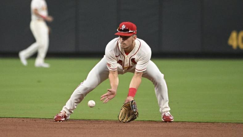 Jul 1, 2023; St. Louis, Missouri, USA; St. Louis Cardinals center fielder Tommy Edman (19) fields a ground ball by the New York Yankees in the eighth inning in game one of a double header at Busch Stadium. Mandatory Credit: Joe Puetz-USA TODAY Sports