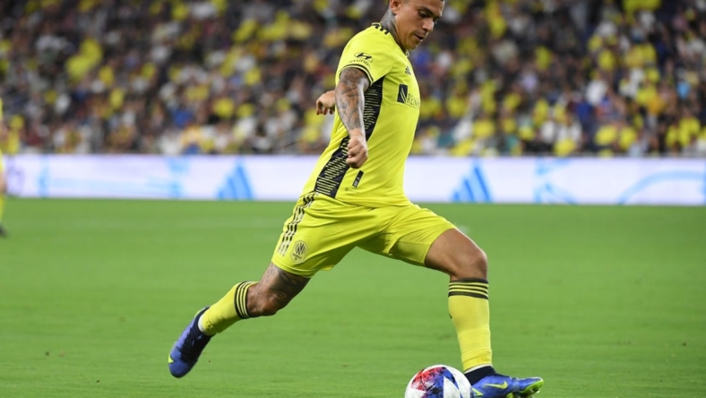 Jul 1, 2023; Nashville, Tennessee, USA; Nashville SC midfielder Randall Leal (8) passes the ball during the second half against the D.C. United at Geodis Park. Mandatory Credit: Christopher Hanewinckel-USA TODAY Sports
