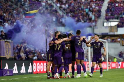 Jul 1, 2023; Orlando, Florida, USA;  Orlando City SC forward Facundo Torres (17) is congratulated after after scoring a goal against the Chicago Fire FC in the first half at Exploria Stadium. Mandatory Credit: Nathan Ray Seebeck-USA TODAY Sports