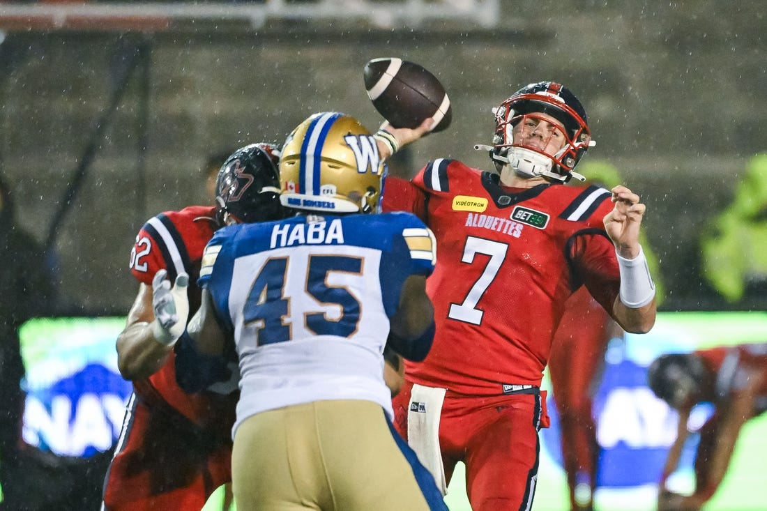 Jul 1, 2023; Montreal, Quebec, CAN; Montreal Alouettes quarterback Cody Fajardo (7) passes the ball against the Winnipeg Blue Bombers during the third quarter at Percival Molson Memorial Stadium. Mandatory Credit: David Kirouac-USA TODAY Sports