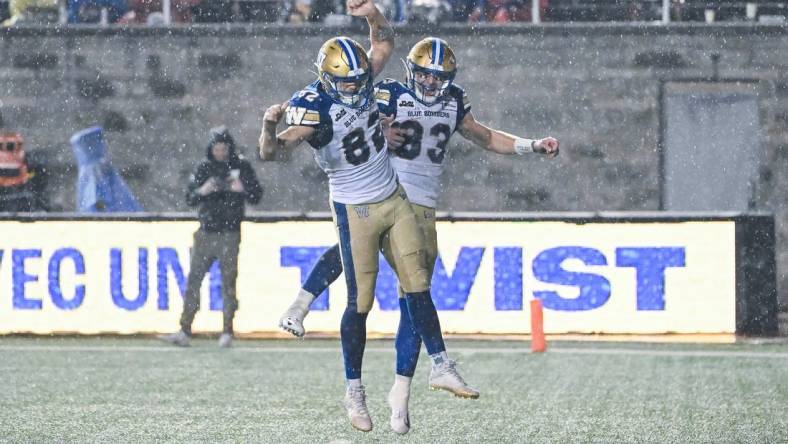 Jul 1, 2023; Montreal, Quebec, CAN; Winnipeg Blue Bombers wide receiver Dalton Schoen (83) celebrates his touchdown against the Montreal Alouettes with his teammates during the third quarter at Percival Molson Memorial Stadium. Mandatory Credit: David Kirouac-USA TODAY Sports