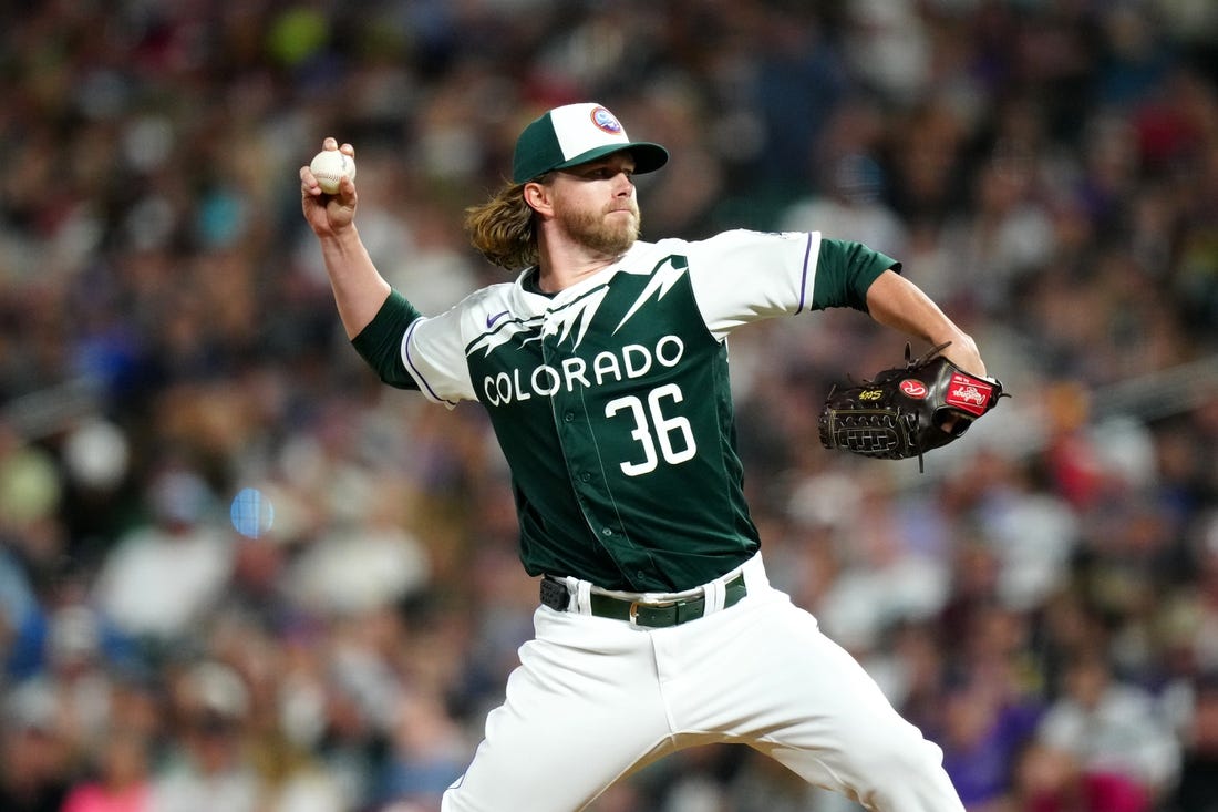 Jul 1, 2023; Denver, Colorado, USA; Colorado Rockies relief pitcher Pierce Johnson (36) delivers a pitch in the tenth inning against the Detroit Tigers at Coors Field. Mandatory Credit: Ron Chenoy-USA TODAY Sports