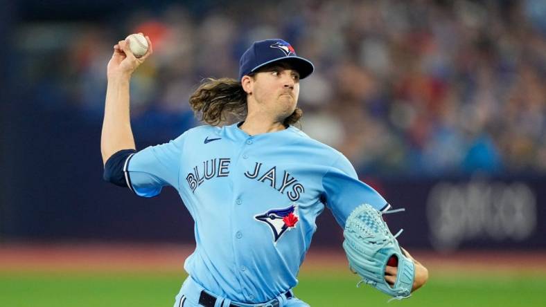 Jul 2, 2023; Toronto, Ontario, CAN;  Toronto Blue Jays starting pitcher Kevin Gausman (34) pitches to the Boston Red Sox during the first inning at Rogers Centre. Mandatory Credit: Kevin Sousa-USA TODAY Sports