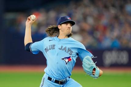 Jul 2, 2023; Toronto, Ontario, CAN;  Toronto Blue Jays starting pitcher Kevin Gausman (34) pitches to the Boston Red Sox during the first inning at Rogers Centre. Mandatory Credit: Kevin Sousa-USA TODAY Sports
