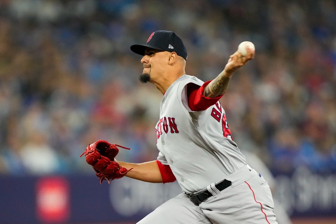 Boston Red Sox Pitcher Mauricio Llovera throws a pitch during the