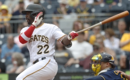 Jul 2, 2023; Pittsburgh, Pennsylvania, USA;  Pittsburgh Pirates designated hitter Andrew McCutchen (22) at bat against the Milwaukee Brewers during the eighth inning at PNC Park. The Brewers won 6-3. Mandatory Credit: Charles LeClaire-USA TODAY Sports