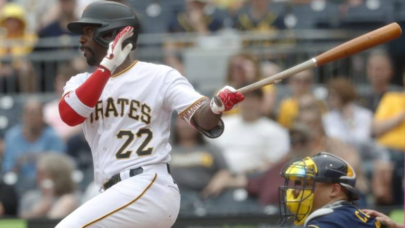 Jul 2, 2023; Pittsburgh, Pennsylvania, USA;  Pittsburgh Pirates designated hitter Andrew McCutchen (22) at bat against the Milwaukee Brewers during the eighth inning at PNC Park. The Brewers won 6-3. Mandatory Credit: Charles LeClaire-USA TODAY Sports