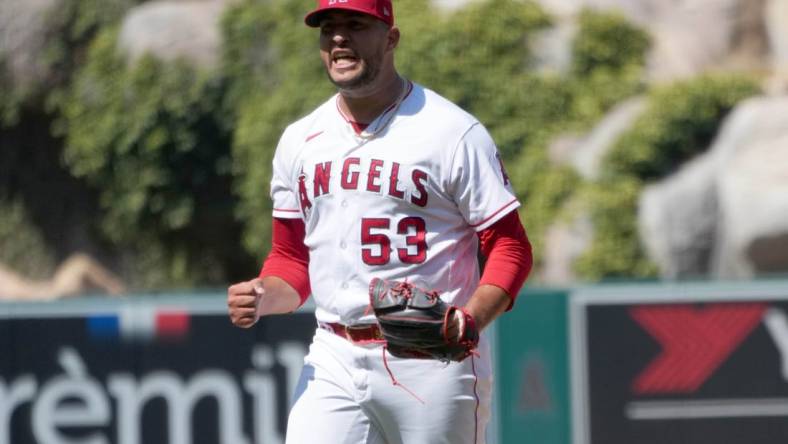 Jul 2, 2023; Anaheim, California, USA; Los Angeles Angels relief pitcher Carlos Estevez (53) celebrates at the end of the game against the Arizona Diamondbacks at Angel Stadium. Mandatory Credit: Kirby Lee-USA TODAY Sports