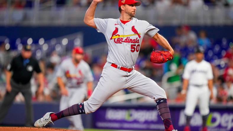 Jul 4, 2023; Miami, Florida, USA; St. Louis Cardinals starting pitcher Adam Wainwright (50) throws a pitch against the Miami Marlins during the first inning at loanDepot Park. Mandatory Credit: Rich Storry-USA TODAY Sports