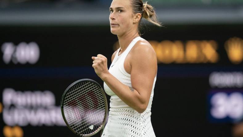 Jul 4, 2023; London, United Kingdom; Aryna Sabalenka reacts to a point during her match against Panna Udvardy (HUN) on day two at the All England Lawn Tennis and Croquet Club.  Mandatory Credit: Susan Mullane-USA TODAY Sports