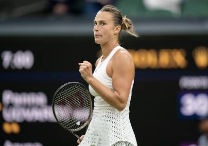 Jul 4, 2023; London, United Kingdom; Aryna Sabalenka reacts to a point during her match against Panna Udvardy (HUN) on day two at the All England Lawn Tennis and Croquet Club.  Mandatory Credit: Susan Mullane-USA TODAY Sports