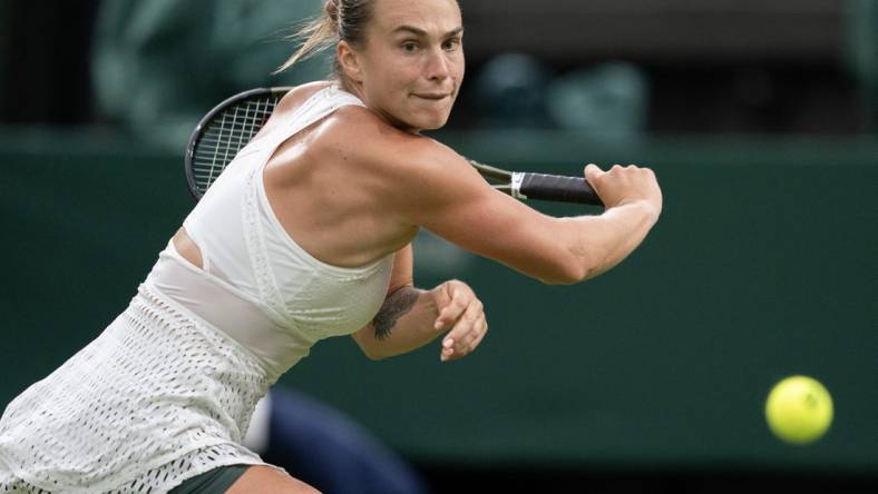 Jul 4, 2023; London, United Kingdom; Aryna Sabalenka returns a shot during her match against Panna Udvardy (HUN) on day two at the All England Lawn Tennis and Croquet Club.  Mandatory Credit: Susan Mullane-USA TODAY Sports