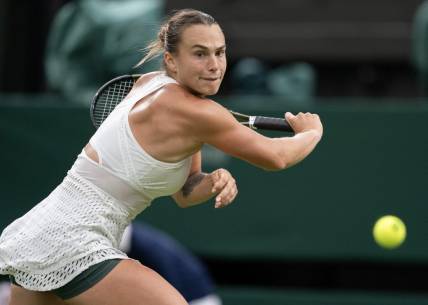 Jul 4, 2023; London, United Kingdom; Aryna Sabalenka returns a shot during her match against Panna Udvardy (HUN) on day two at the All England Lawn Tennis and Croquet Club.  Mandatory Credit: Susan Mullane-USA TODAY Sports