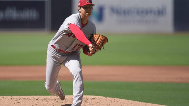 Jul 4, 2023; San Diego, California, USA;  Los Angeles Angels starting pitcher Shohei Ohtani (17) throws a pitch against the San Diego Padres during the first inning at Petco Park. Mandatory Credit: Ray Acevedo-USA TODAY Sports