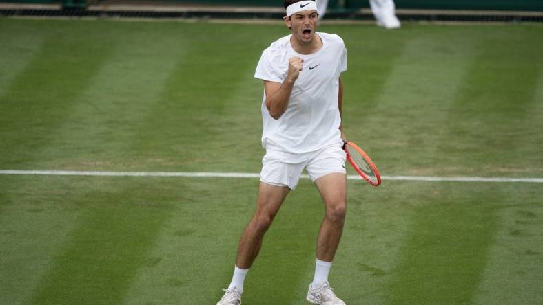 Jul 5, 2023; London, United Kingdom; Taylor Fritz (USA) reacts to a point during his match against Yannick Hanfmann  (GER) on day three at the All England Lawn Tennis and Croquet Club.  Mandatory Credit: Susan Mullane-USA TODAY Sports