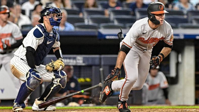 Jul 5, 2023; Bronx, New York, USA; Baltimore Orioles left fielder Colton Cowser (17) hits a RBI single against the New York Yankees during the sixth inning at Yankee Stadium. Mandatory Credit: John Jones-USA TODAY Sports